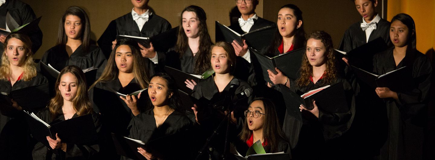 Robed students sing in the Choir and Dance Performance on May 3, 2019.