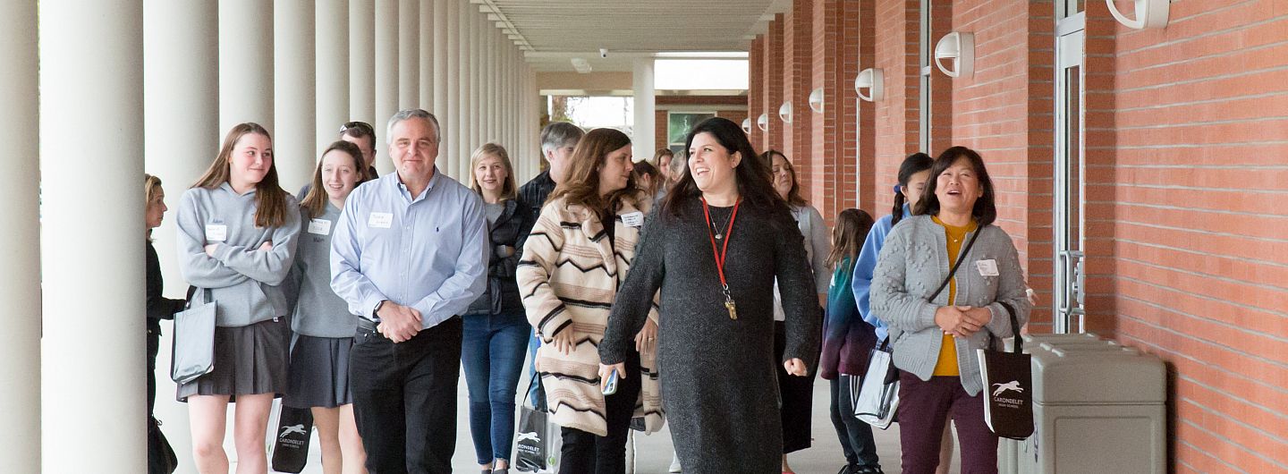 Jessica Mix'99, Director of Enrollment, leads a tour of prospective students and families.
